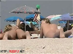 blonde model naturist on the naked beach spycam video